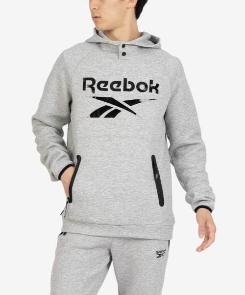 Reebok(リーボック)の「ロゴ フードトップ / OVERHEAD HOODY FLEECE(パーカー・メンズ・グレー/グリーン/ブラック・LARGE/MEDIUM/SMALL)」の1枚目の写真