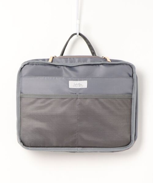 cache cache(カシュ カシュ)の「カシュカシュ cachecache / リバーシブルバッグインバッグL(クラッチバッグ・レディース・ブラック/オレンジ/アイボリー/ベージュ系その他/その他/ホワイト×ブラック・FREE)」の8枚目の写真