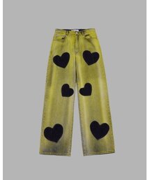 THEMUSEUMVISITOR（ザミュージアムビジター）の「HEART BLEACHED DENIM PANTS (YELLOW)（デニムパンツ）」
