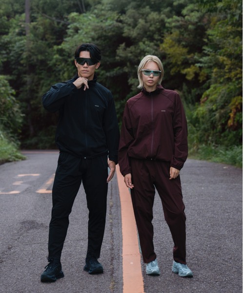 TENEZ(テネス)の「Track Jacket 撥水-Stretch(セットアップ・メンズ・エンジ/ブラック・LARGE/MEDIUM)」の3枚目の写真