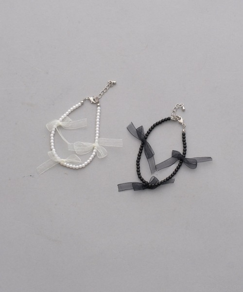 one after another NICE CLAUP（ワンアフターアナザーナイスクラップ）の「【ribbon collection】オーガンリボンブレスレット（ブレスレット・レディース・アイボリー/ブラック・FREE）」の4枚目の写真
