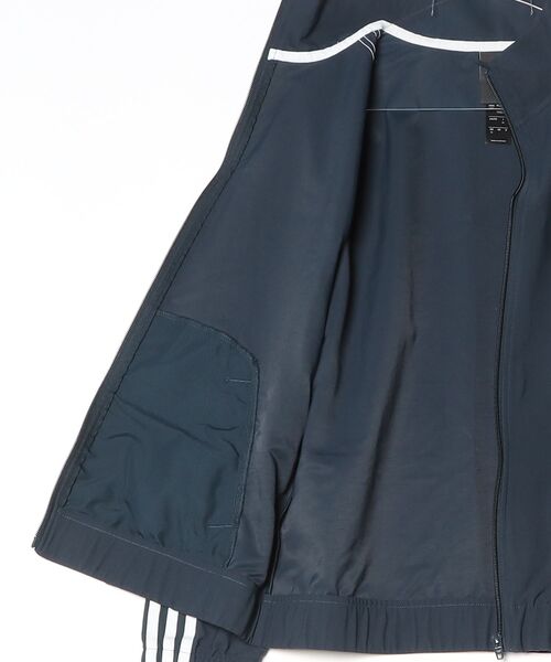 adidas(アディダス)の「SKATEBOARDING SUPERFIRE TRACK JACKET / アディダスオリジナルス adidas Originals(ナイロンジャケット・メンズ・ブルー・XX-LARGE/3XL/LARGE/MEDIUM/SMALL/X-LARGE/X-SMALL)」の4枚目の写真