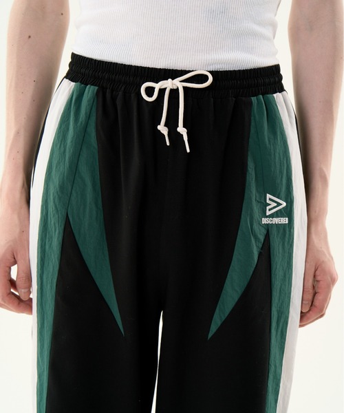 DISCOVERED（ディスカバード）の「DISCOVERED TRACK SUITS TRACK PANTS（その他パンツ・メンズ・ブラック/グレー・1/3）」の11枚目の写真