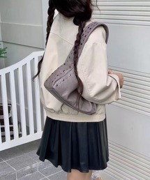 Chiina（チーナ）の「Chiina / スタッズ ハンドバッグ（ハンドバッグ）」