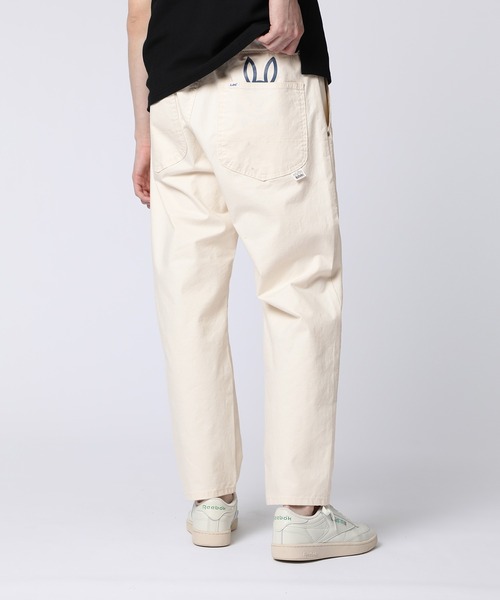 Psycho Bunny(サイコバニー)の「Lee × Psycho Bunny FLeeasy Narrow ストレッチツイル デニム(スラックス・メンズ・アイボリー・FREE)」の1枚目の写真