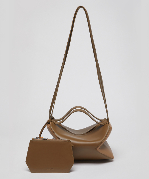 Archivepke(アーカイブエプク)の「Small doughnut fold bag(Old book cover)_OVBAX25020MCB(ショルダーバッグ・レディース・その他・OS)」の1枚目の写真