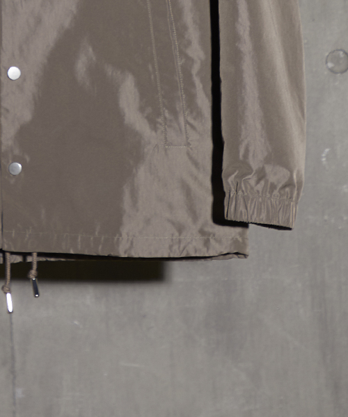 NUMBER (N)INE（ナンバーナイン）の「【NUMBER (N)INE】≪STUDIOUS限定≫別注バックプリントコーチジャケット（ブルゾン・メンズ・ブラック/オリーブ・2/1/3）」の11枚目の写真