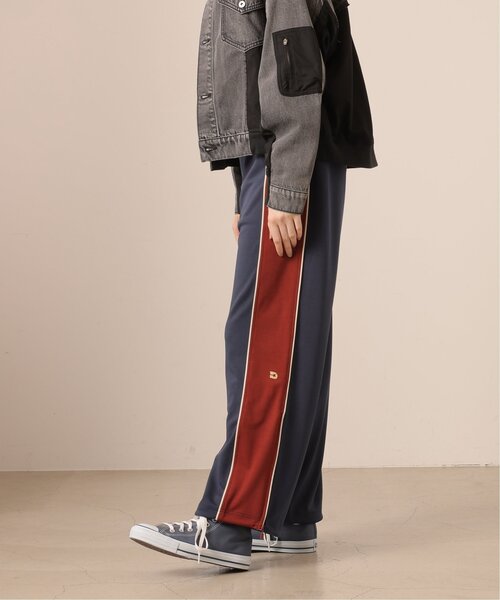 DOUBLE NAME（ダブルネーム）の「パイピングレトロトラックパンツ/ユニ