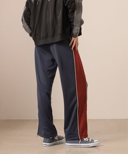 DOUBLE NAME（ダブルネーム）の「パイピングレトロトラックパンツ/ユニ