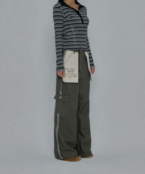 GILAARCHIVE（ギラアーカイブ）の「REVERSE STITCHED CARGO PANTS_KHAKI（その他パンツ・レディース・カーキ・SMALL/MEDIUM）」の2枚目の写真