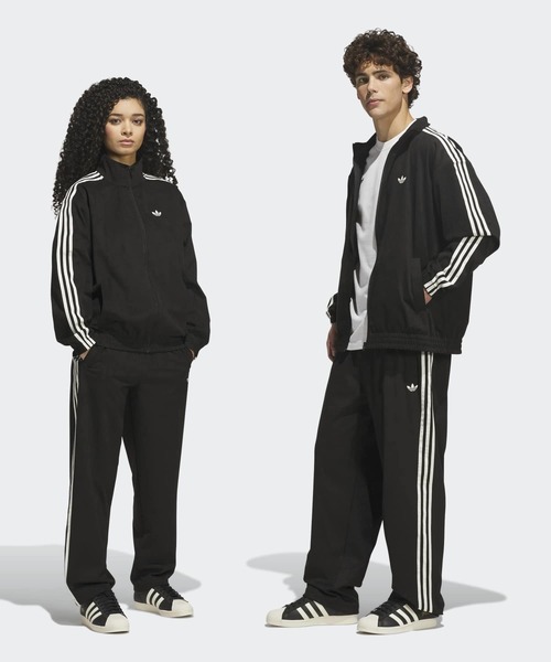 adidas(アディダス)の「スケートボーディング ビンテージ スーパーファイヤー トラックパンツ / アディダスオリジナルス adidas Originals(スウェットパンツ・メンズ・ブラック・LARGE/MEDIUM/XX-LARGE/3XL/SMALL/X-LARGE/X-SMALL)」の1枚目の写真