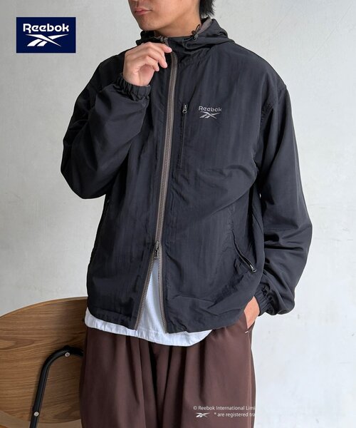 Reebok(リーボック)の「【Reebok】リバーシブルフーディジャケット(ブルゾン・メンズ・ブラック/ブラウン/ネイビー・MEDIUM/LARGE)」の2枚目の写真