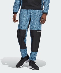 adidas（アディダス）の「アディダス アドベンチャー ウィンター 総柄プリント パンツ / アディダスオリジナルス（その他パンツ・メンズ）」
