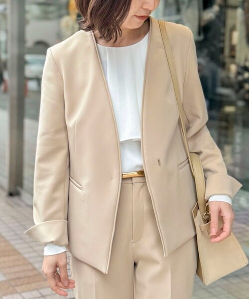 NOLLEY’S Sophi（ノーリーズソフィ）の「《セットアップ対応》ウォッシャブルWクロス2WAYストレッチジャケット（ノーカラージャケット・レディース・ネイビー/ベージュ・36/38）」の2枚目の写真