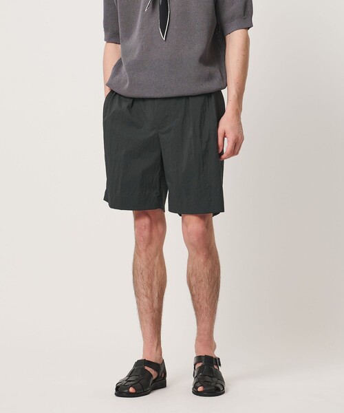 UNITED ARROWS(ユナイテッドアローズ)の「ワッシャーナイロン 2プリーツ サイドアジャスター ショーツ 撥水 ヨコストレッチ(その他パンツ・メンズ・ブラック/オリーブ/ライラック・S/L/XL/M)」の1枚目の写真