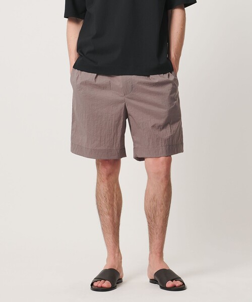 UNITED ARROWS(ユナイテッドアローズ)の「ワッシャーナイロン 2プリーツ サイドアジャスター ショーツ 撥水 ヨコストレッチ(その他パンツ・メンズ・ブラック/オリーブ/ライラック・S/L/XL/M)」の5枚目の写真