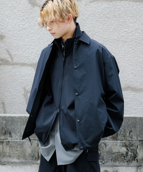 Uiscel（ユイセル）の「Uiscel　リップストップコーチジャケット（ナイロンジャケット・メンズ・ブラック/チャコールグレー・LARGE/MEDIUM）」の5枚目の写真