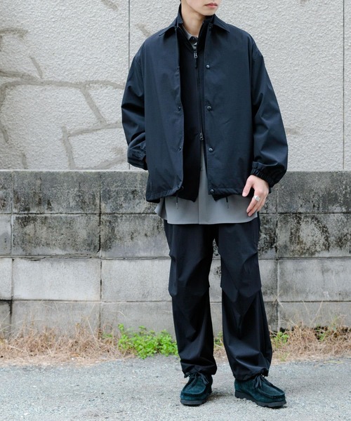 Uiscel（ユイセル）の「Uiscel　リップストップコーチジャケット（ナイロンジャケット・メンズ・ブラック/チャコールグレー・LARGE/MEDIUM）」の6枚目の写真