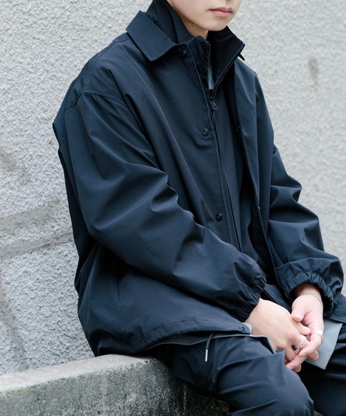 Uiscel（ユイセル）の「Uiscel　リップストップコーチジャケット（ナイロンジャケット・メンズ・ブラック/チャコールグレー・LARGE/MEDIUM）」の8枚目の写真