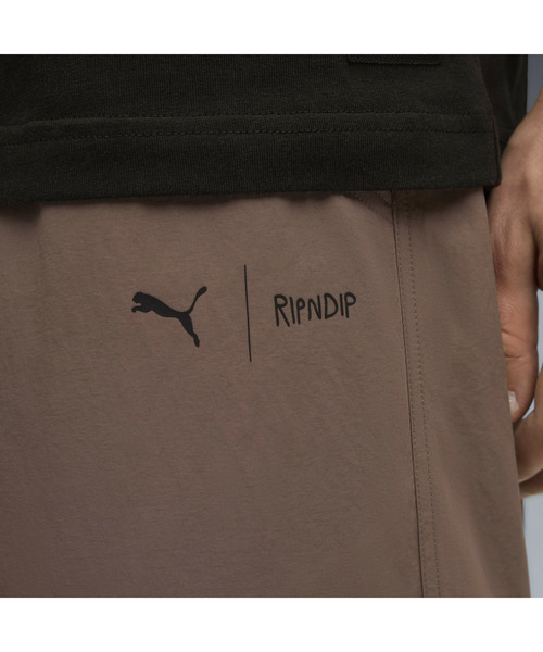 PUMA(プーマ)の「PUMA プーマ ユニセックス PUMA x RIPNDIP エクストリーム カーゴパンツ(その他パンツ・メンズ・ブロンズ/ブラック・SMALL/MEDIUM/LARGE/X-LARGE/X-SMALL)」の13枚目の写真