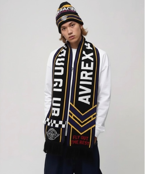 AVIREX（アヴィレックス）の「AVIREX / AX EX SURPLUS AVIREX AIR RACING CLUB / 81408900（マフラー・メンズ・オフホワイト/ブラック/エンジ・FREE）」の2枚目の写真