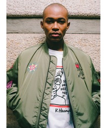 Alpha Industries（アルファインダストリーズ）の「Alpha Industries アルファインダストリーズ Keith Haring X Alpha MA-1 ALL REVERSIBLE  キース へリング エムエーワン オール リバーシブル（MA-1）」