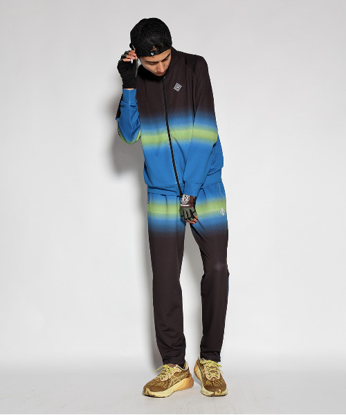ELDORESO(エルドレッソ)の「Tsegay Track Pants / ツェガイトラックパンツ(スウェットパンツ・メンズ・ブルー・LARGE/MEDIUM/SMALL)」の1枚目の写真