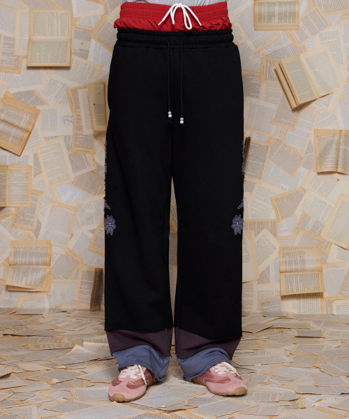 UNALLOYED(アナロイド)の「レイヤードヘムスウェットパンツ / ブラック(スウェットパンツ・メンズ・その他・MEDIUM/LARGE)」の1枚目の写真