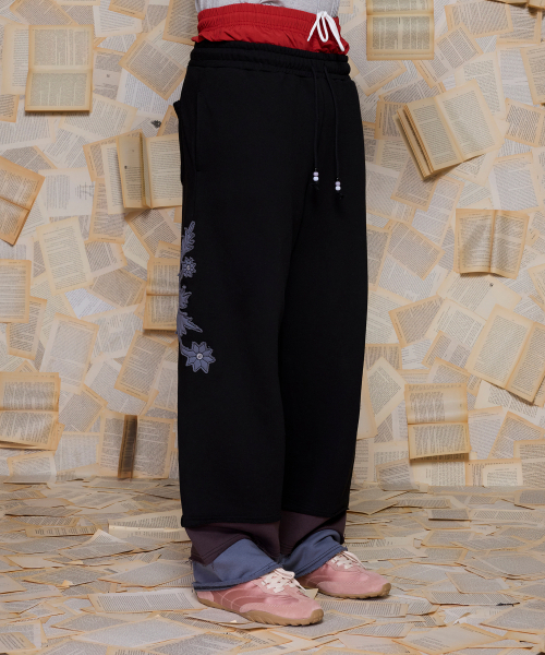 UNALLOYED(アナロイド)の「レイヤードヘムスウェットパンツ / ブラック(スウェットパンツ・メンズ・その他・MEDIUM/LARGE)」の2枚目の写真