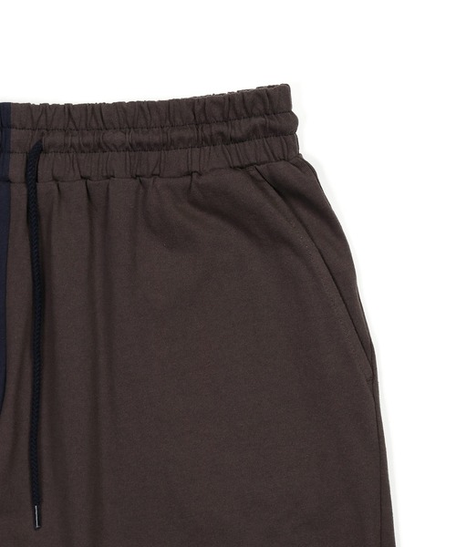 The DUFFER of ST.GEORGE(ザダファーオブセントジョージ)の「【WEB限定アイテム】8oz HEAVYWEIGHT PANEL SWITCHING GYM SHORTS:セットアップ対応 バイカラージムショーツ/ バギーショーツ / ヘビーウェイト / 8オンス / 切り替えショーツ / クレイジーパターン(その他パンツ・メンズ・スミクロ/ネイビー・MEDIUM/LARGE/X-LARGE)」の11枚目の写真