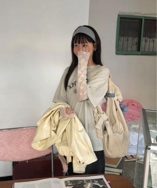 kirakiraShop(キラキラショップ)の「リボン柄 シアー トップス(Tシャツ/カットソー・レディース・ホワイト/ブラック・FREE)」の7枚目の写真