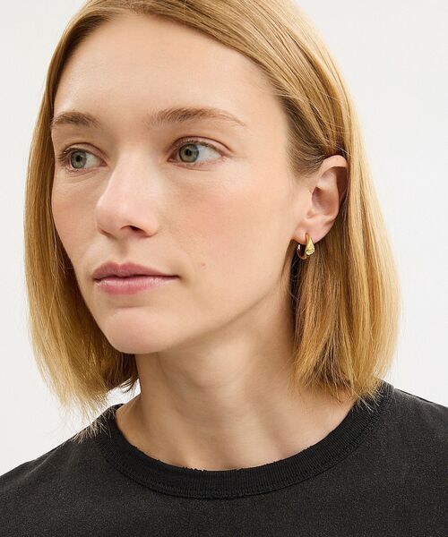 COACH（コーチ）の「シグネット シグネチャー ハギー ピアス（ピアス