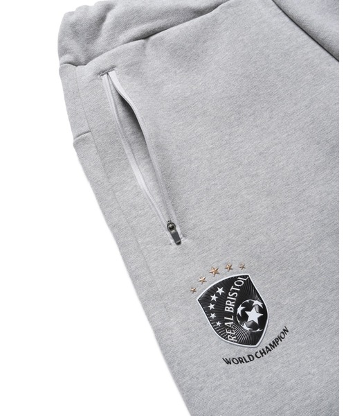 F.C.Real Bristol（エフシーレアルブリストル）の「CHAMPIONS BONDING SWEAT PANTS（スウェットパンツ・メンズ・ネイビー/ブラック/グレー・SMALL/MEDIUM/LARGE/X-LARGE/XX-LARGE）」の14枚目の写真
