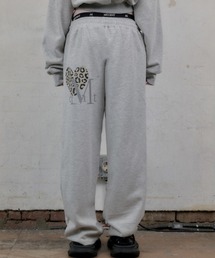 MUCENT（ムセント）の「A'GEM/9 × .kom 『MUCENT/ムセント』 SIERRA LEOPARD HEART SWEAT PANTS UNISEX /ヒョウ柄ハートスウェット パンツ（スウェットパンツ）」