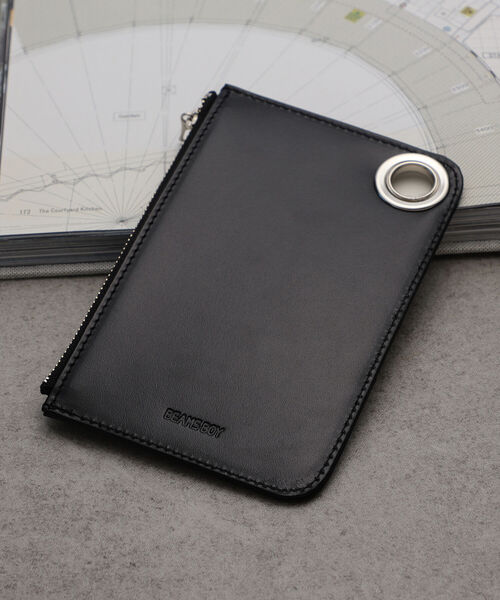 BEAMS BOY(ビームスボーイ)の「BEAMS BOY / ビッグ ハトメ フラグメント ケース(財布・レディース・ブラック/レッド・ONE SIZE)」の1枚目の写真