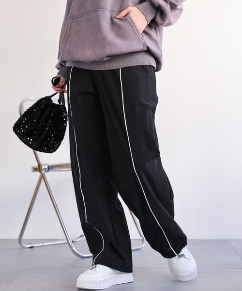 CREARE -LINO-(クレアーレリノ)の「ナイロンライントラックパンツ/セットアップ<ユニセックス>(その他パンツ・メンズ・ブラック/オフホワイト/チャコールグレー・M/L)」の14枚目の写真