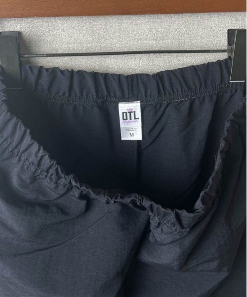 INNOCENT(イノセント)の「【T2】【OTL apparel】2331-UNISEX NYLON TRACK PANTS(その他パンツ・メンズ・ベージュ/ブラック/カーキ/オリーブ/シルバー・MEDIUM)」の19枚目の写真