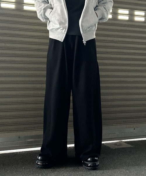 NYLAUS(ナイラス)の「【Nylaus】2026SS 裾カットオフ ベルトループ付き スウェット カーブパンツ バレルパンツ ケミカル加工(スウェットパンツ・メンズ・ブラック系その他/ブラック・M/L/S)」の1枚目の写真