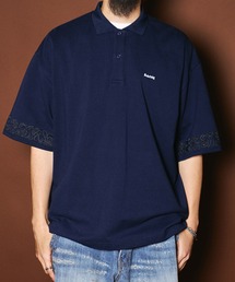 Subciety（サブサエティ）の「Sleeve embroidery polo shirt（ポロシャツ）」
