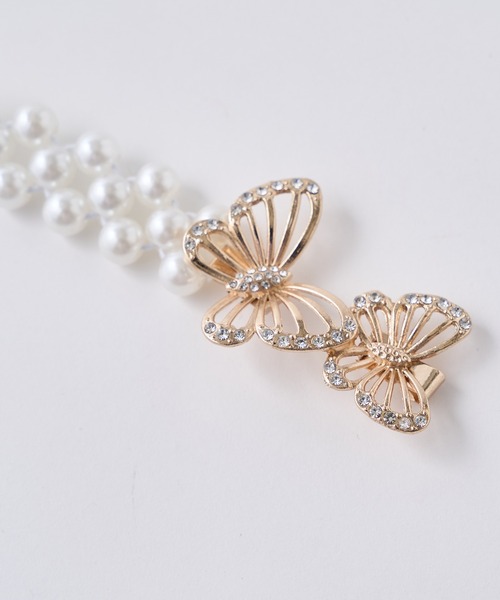 one after another NICE CLAUP（ワンアフターアナザーナイスクラップ）の「モチーフ付きパールベルト（ベルト・レディース・ホワイト/ゴールド・ONE SIZE）」の2枚目の写真