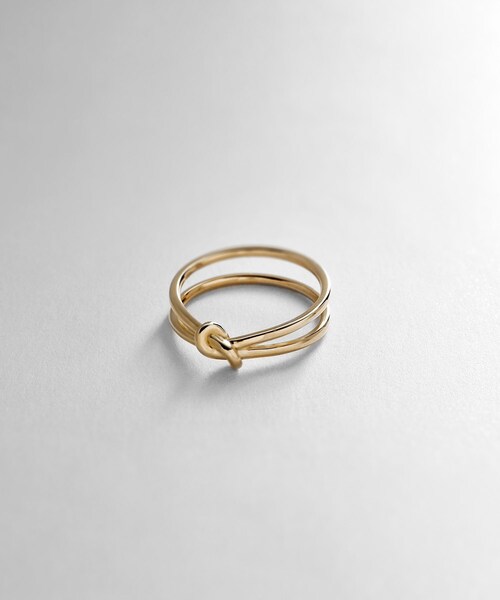 COCOSHNIK(ココシュニック)の「K10ノット ダブルアームリング(リング・レディース・ホワイト系その他7・10号/12号/14号)」の1枚目の写真