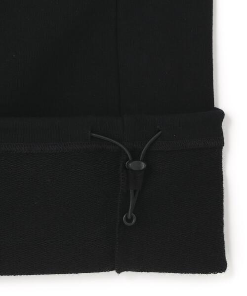 AVIREX(アヴィレックス)の「SIGNATURE VARSITY LOGO SWEAT PANTS(スウェットパンツ・レディース・グレー/オフホワイト/ブラック・S/M)」の7枚目の写真