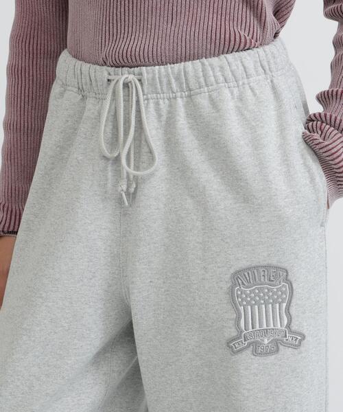 AVIREX(アヴィレックス)の「SIGNATURE VARSITY LOGO SWEAT PANTS(スウェットパンツ・レディース・グレー/オフホワイト/ブラック・S/M)」の13枚目の写真