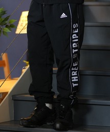 adidas/アディダス M WORD ウーブンパンツ 裏起毛 ルーズシルエット ユーティリティ ストリート セットアップ対応 KWY00