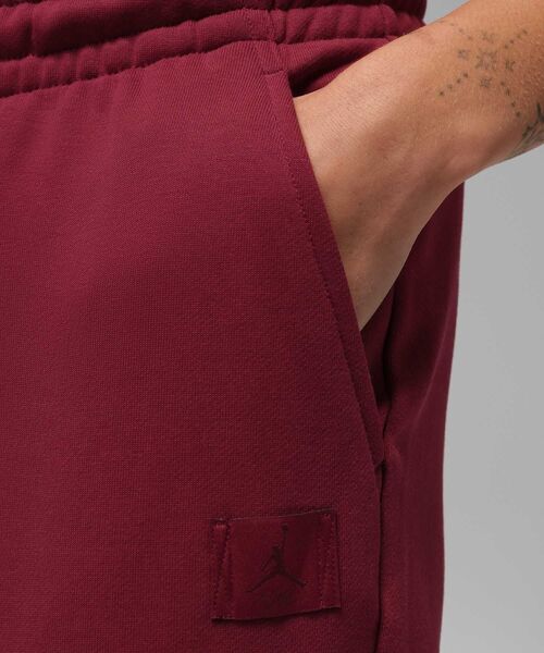 JORDAN BRAND（ジョーダンブランド）の「ジョーダン フライト フリース ウィメンズ フレア パンツ / Jordan Flight Fleece Women's Flared Pants IF1025-677 Team Red（スウェットパンツ・レディース・レッド・L/M/XS/S/XL）」の3枚目の写真