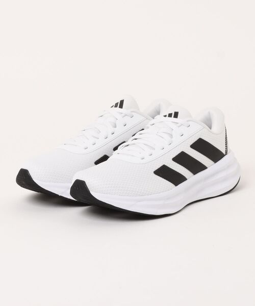 adidas(アディダス)の「【adidas】GALAXY RUN(スニーカー・メンズ・ホワイト×ブラック・25.0cm/25.5cm/26.0cm/26.5cm/27.0cm/27.5cm/28.0cm/29.0cm)」の1枚目の写真