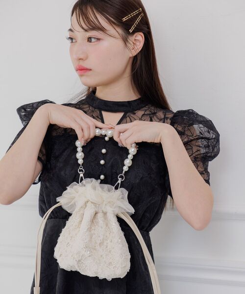 RETRO GIRL(レトロガール)の「チュール巾着バッグ(ハンドバッグ・レディース・オフホワイト/ブラック・ONE SIZE)」の6枚目の写真