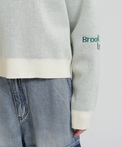 AVIREX(アヴィレックス)の「【直営店限定】LOGO JACQUARD AND EMBROIDERY TOPS(ニット/セーター・レディース・ネイビー/オフホワイト/オレンジ・F)」の19枚目の写真