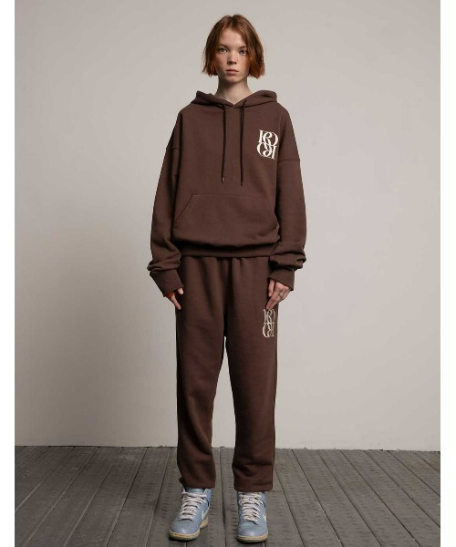 ROCCI ROCCI(ロッシロッシ)の「A'GEM/9 × .kom『ROCCI ROCCI/ロッシロッシ』Classic Symbol Hoodie/クラシックシンボル プルオーバーパーカー(パーカー・レディース・ライトグレー/ブラウン・FREE)」の12枚目の写真