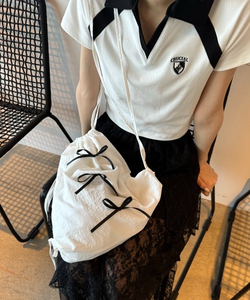 FOREVER 21(フォーエバー トゥエンティーワン)の「【2024SS】リボンナップサック(バックパック/リュック・レディース・ネイビー/ホワイト・FREE)」の14枚目の写真